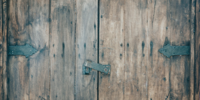 A door with arrow brackets
