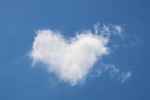 Heart-shaped cloud on a blue background