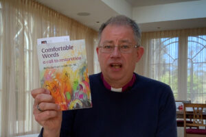 Bishop Stephen Croft with his new book Comfortable Words