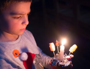 Boy holding Christingle