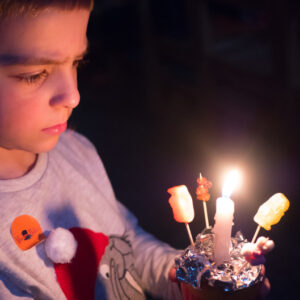 Boy holding Christingle