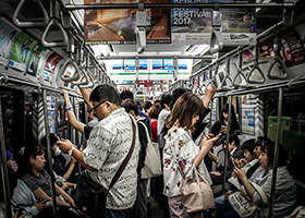 Crowded Tokyo subway train carriage